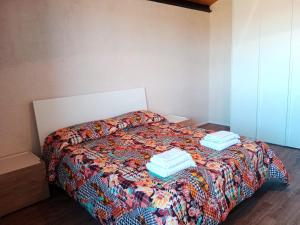 Postel nebo postele na pokoji v ubytování Vigna di pettineo - guest house