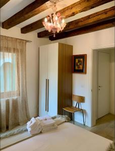 Postel nebo postele na pokoji v ubytování B&B Fortuny