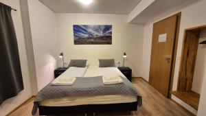 Voodi või voodid majutusasutuse Kirkjufell Hotel by Snæfellsnes Peninsula West Iceland - Grundarfjordur toas