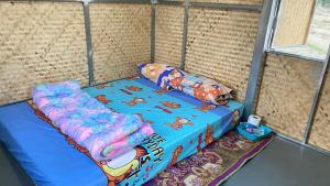 Postel nebo postele na pokoji v ubytování Poopha home stay