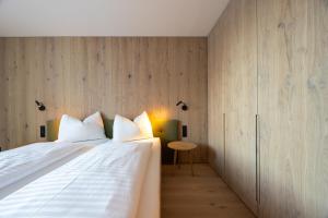 Postel nebo postele na pokoji v ubytování Appartements Kammerlander