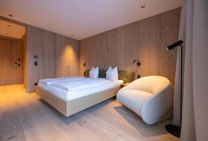 Postel nebo postele na pokoji v ubytování Appartements Kammerlander