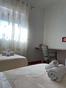 Postel nebo postele na pokoji v ubytování Guest House Ilir
