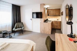 Kuchyň nebo kuchyňský kout v ubytování Hotel Tomas