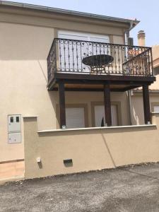 a balcony on the side of a house at Tonka Apartments in Zadar