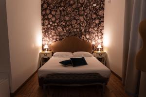 Posteľ alebo postele v izbe v ubytovaní B&B Donna Cinzia