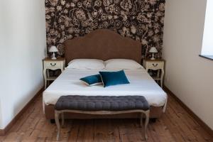 Posteľ alebo postele v izbe v ubytovaní B&B Donna Cinzia