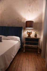 Posteľ alebo postele v izbe v ubytovaní B&B Donna Cinzia