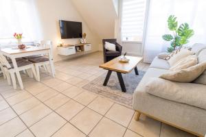 Posezení v ubytování Ferienwohnung Strandkiste