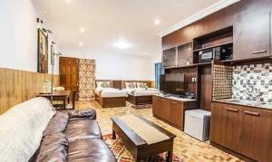 Kuchyň nebo kuchyňský kout v ubytování Kevins Bearshola Residency