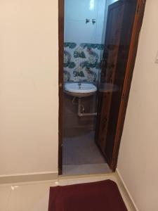 Koupelna v ubytování Saai Residency Tiruvannamalai
