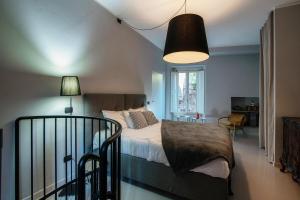 Ένα ή περισσότερα κρεβάτια σε δωμάτιο στο My Hideaway - Laglio