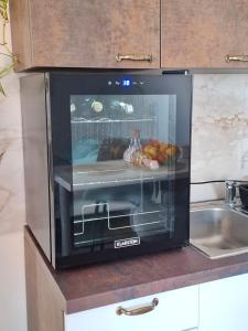 Η κουζίνα ή μικρή κουζίνα στο Hillview apartman Slavagora, Croatia
