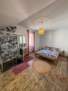Postel nebo postele na pokoji v ubytování Superbe Loft Spa Jacuzzi Cinema