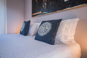 Кровать или кровати в номере Buganvilias Do Meco Guest house