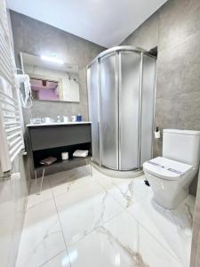 Koupelna v ubytování Feeling Home - Suites&Rooms + 37 fotografií
