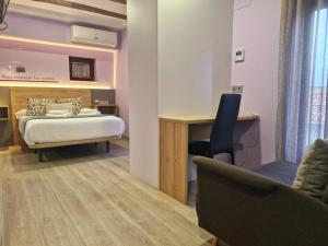 Postel nebo postele na pokoji v ubytování Feeling Home - Suites&Rooms