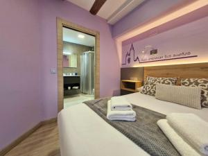 Postel nebo postele na pokoji v ubytování Feeling Home - Suites&Rooms