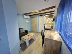 Posezení v ubytování Feeling Home - Suites&Rooms