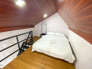 Casa Damai Janda Baik - RIVERVIEW TINY HOUSE客房内的一张或多张床位