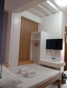 TV/trung tâm giải trí tại Leila Pension House