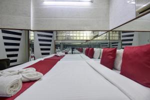 Postel nebo postele na pokoji v ubytování Sun Guest House