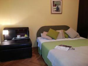Postel nebo postele na pokoji v ubytování Dubrovnik Residence Nodilo
