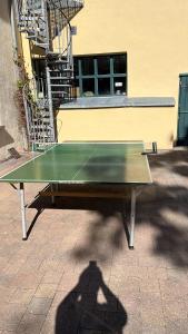 a ping pong table in front of a building at Saarwein Gut in Wiltingen in Wiltingen +11 photos