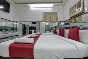 Postel nebo postele na pokoji v ubytování Sun Guest House