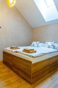 Postel nebo postele na pokoji v ubytování Apartmán ZA-KA 4 ubytování Litovel