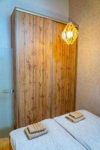 Postel nebo postele na pokoji v ubytování Apartmán ZA-KA 4 ubytování Litovel + 3 fotografie