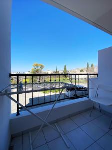 a balcony with a view of a street at STAY Anthea Gardens - Calm Living in Paphos