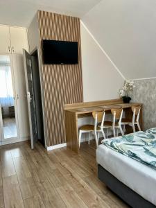 Łóżko lub łóżka w pokoju w obiekcie Pensjonat Zatoka 17