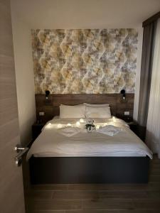 Postel nebo postele na pokoji v ubytování Friends Apartmani - Broj 2 + 14 fotografií