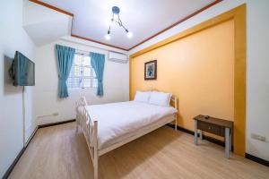 Letto o letti in una camera di Green Inn