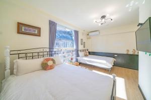 Letto o letti in una camera di Green Inn