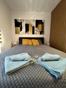 Postel nebo postele na pokoji v ubytování Vlasic Apartmani LENA