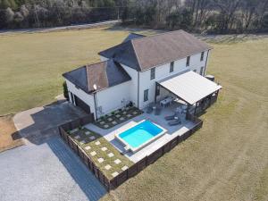 an overhead view of a house with a swimming pool at Music City Manor-A Grand Ole Getaway in Goodlettsville