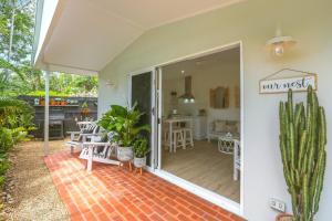 a house with a patio with a cactus at The Beach Nest at Yule Avenue in Clifton Beach