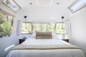 Posteľ alebo postele v izbe v ubytovaní AutoCamp Sequoia