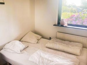 Postel nebo postele na pokoji v ubytování 8 person holiday home in Struer-By Traum