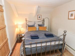 En eller flere senge i et værelse på Millfield