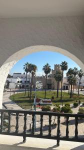 a view of a park from under a bridge at Bungalow avec une vue panoramique in Sousse