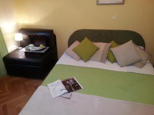 Postel nebo postele na pokoji v ubytování Dubrovnik Residence Nodilo
