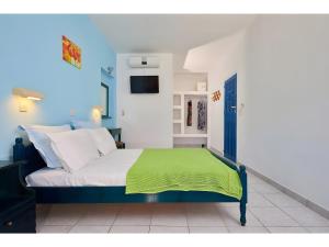 Postel nebo postele na pokoji v ubytování Hotel Glaros Karpathos