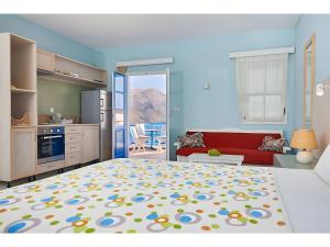 Postel nebo postele na pokoji v ubytování Hotel Glaros Karpathos