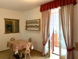 Fotografie z fotogalerie ubytování Appartamenti Sissi v destinaci Commezzadura