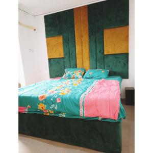 Cama o camas de una habitación en Jeymax Hotel and Suite