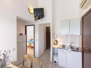 Kuchyň nebo kuchyňský kout v ubytování Apartments Pletikosa Gaj