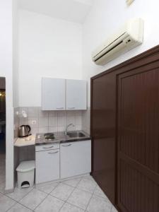 Kuchyň nebo kuchyňský kout v ubytování Apartments Pletikosa Gaj